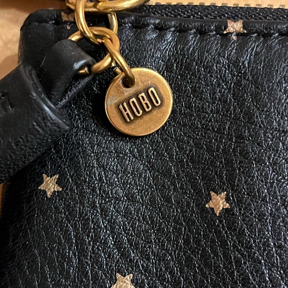 Hobo large wristlet dark blue leather with tiny gold stars 
wristlet 10.5” x 7” - Picture 5 of 7